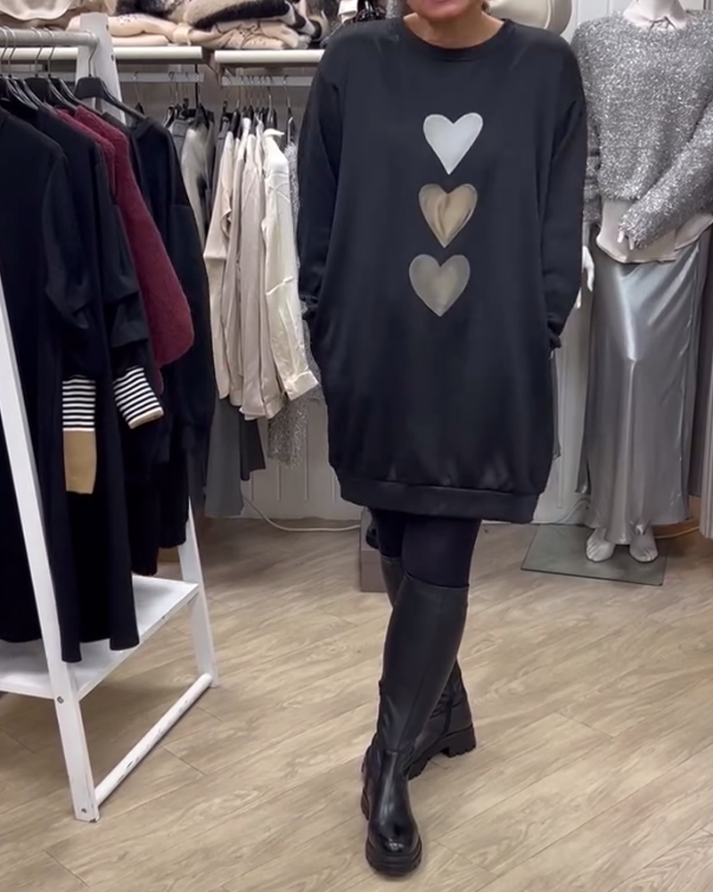Elegant comfort with a charming heart print sweatshirt