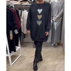 Elegant comfort with a charming heart print sweatshirt