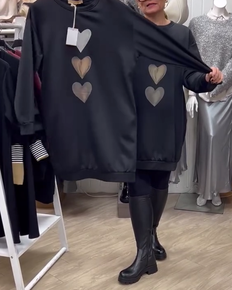 Elegant comfort with a charming heart print sweatshirt