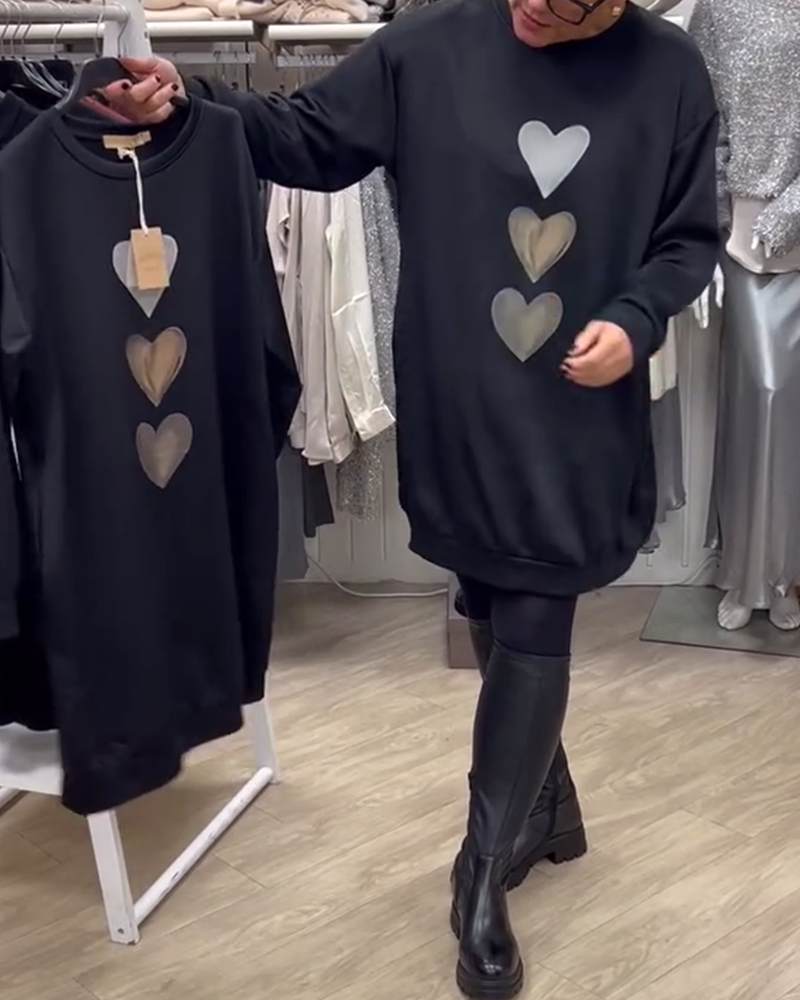 Elegant comfort with a charming heart print sweatshirt