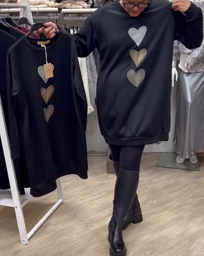 Elegant comfort with a charming heart print sweatshirt