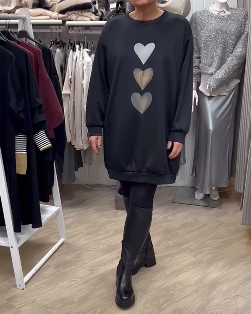 Elegant comfort with a charming heart print sweatshirt